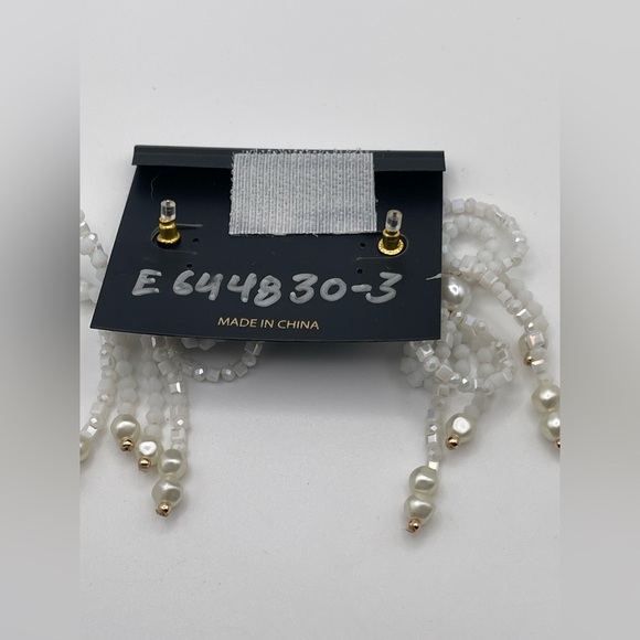 NWT nOir Jewelry White Beaded Pearlescent Bow Earrings with Gold Tone Accents - Picture 3 of 3